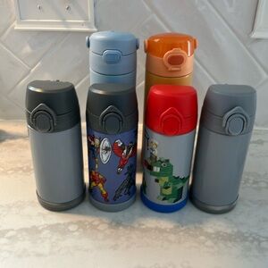 Six water bottles, 4 PBK and 2 Thermos brand